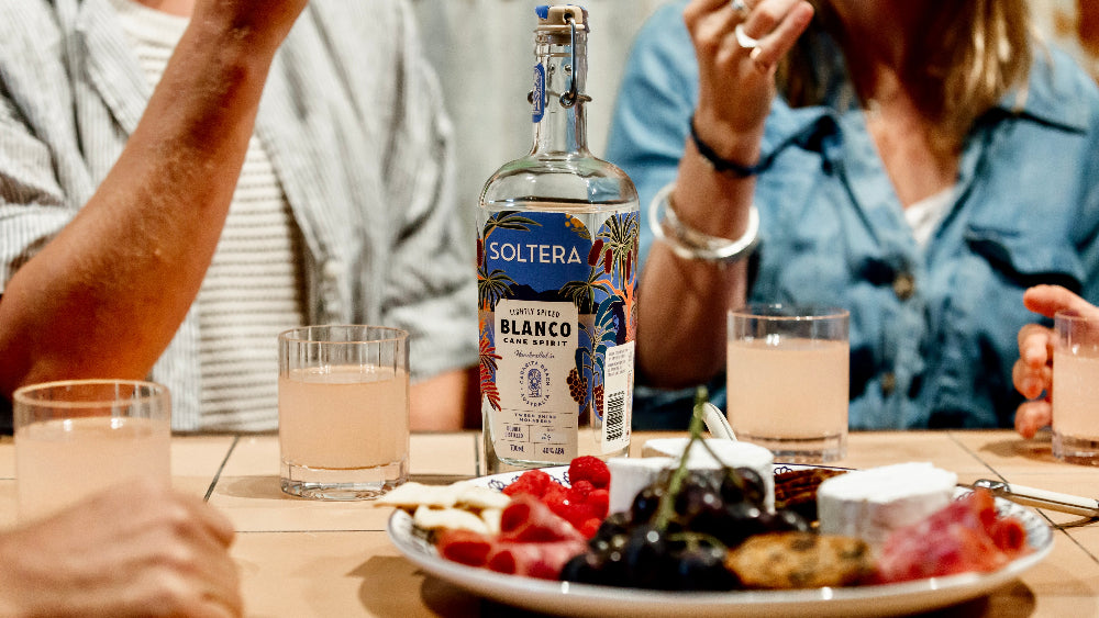 Soltera Rum Blanco Paloma and Cheese Board